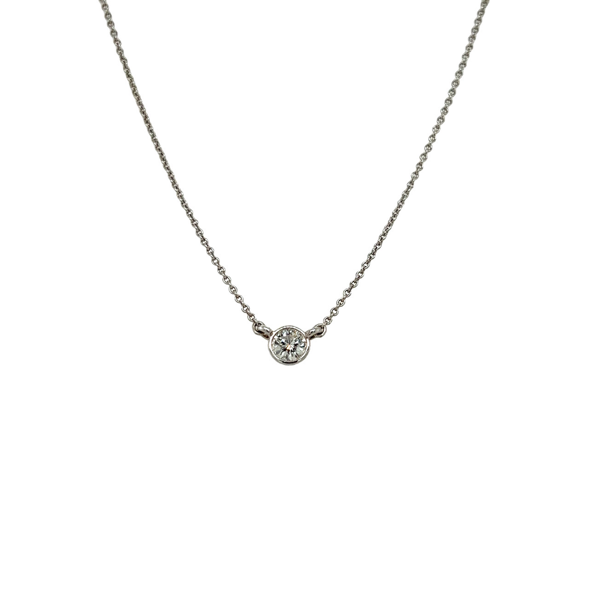 white gold necklace with round diamond