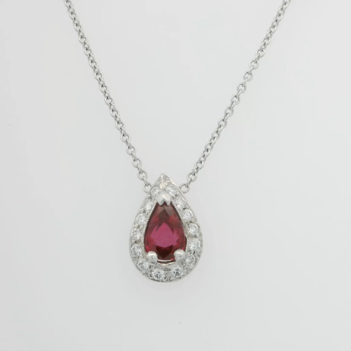 Pear Shape Ruby Necklace with Diamond Halo