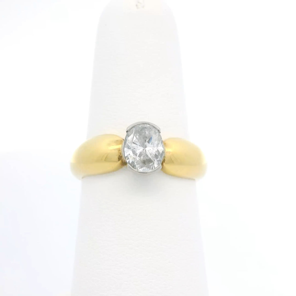 Partial Bezel Set Oval Engagement Ring