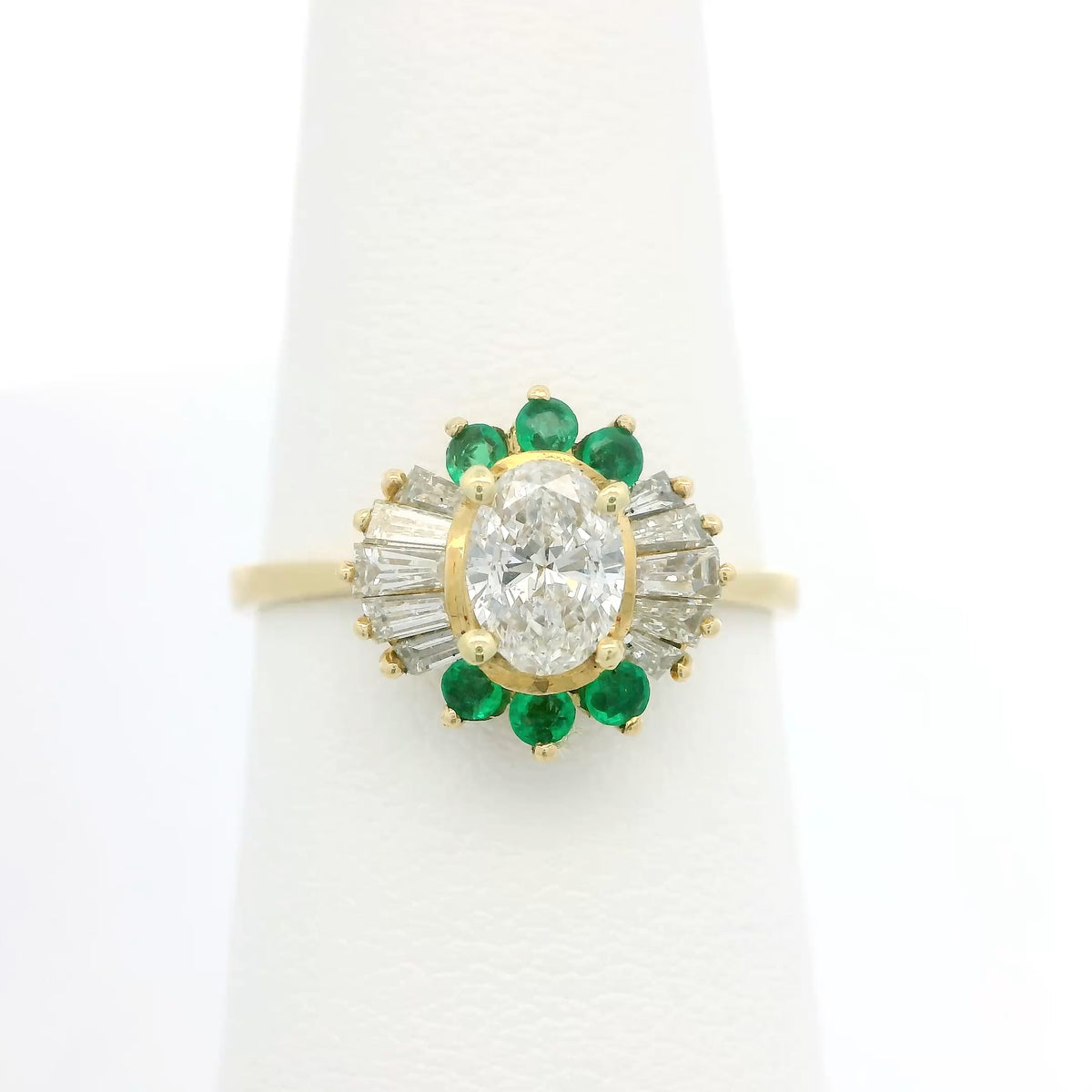 Oval Diamond Ring with Emerald Accents