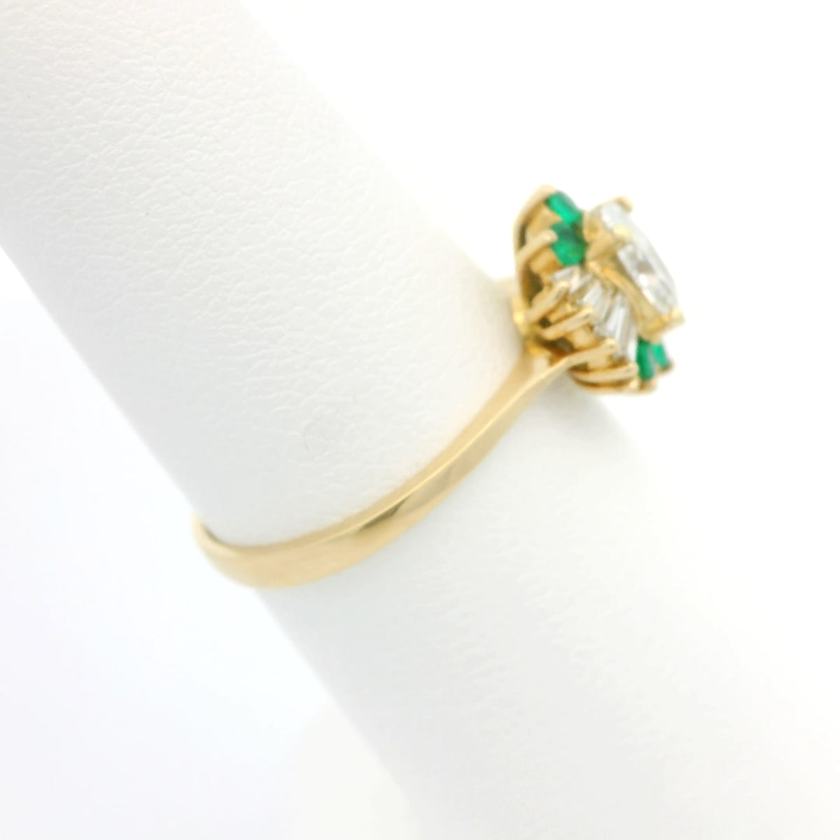Oval Diamond Ring with Emerald Accents