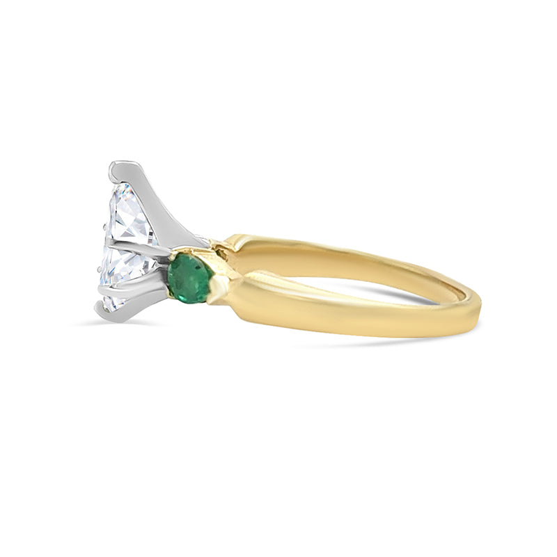 Diamond Engagement Ring with Emerald Side Stones